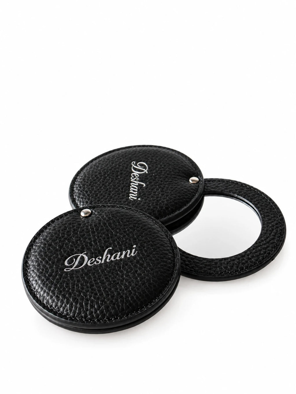 Deshani Compact Leather Mirror on a white background