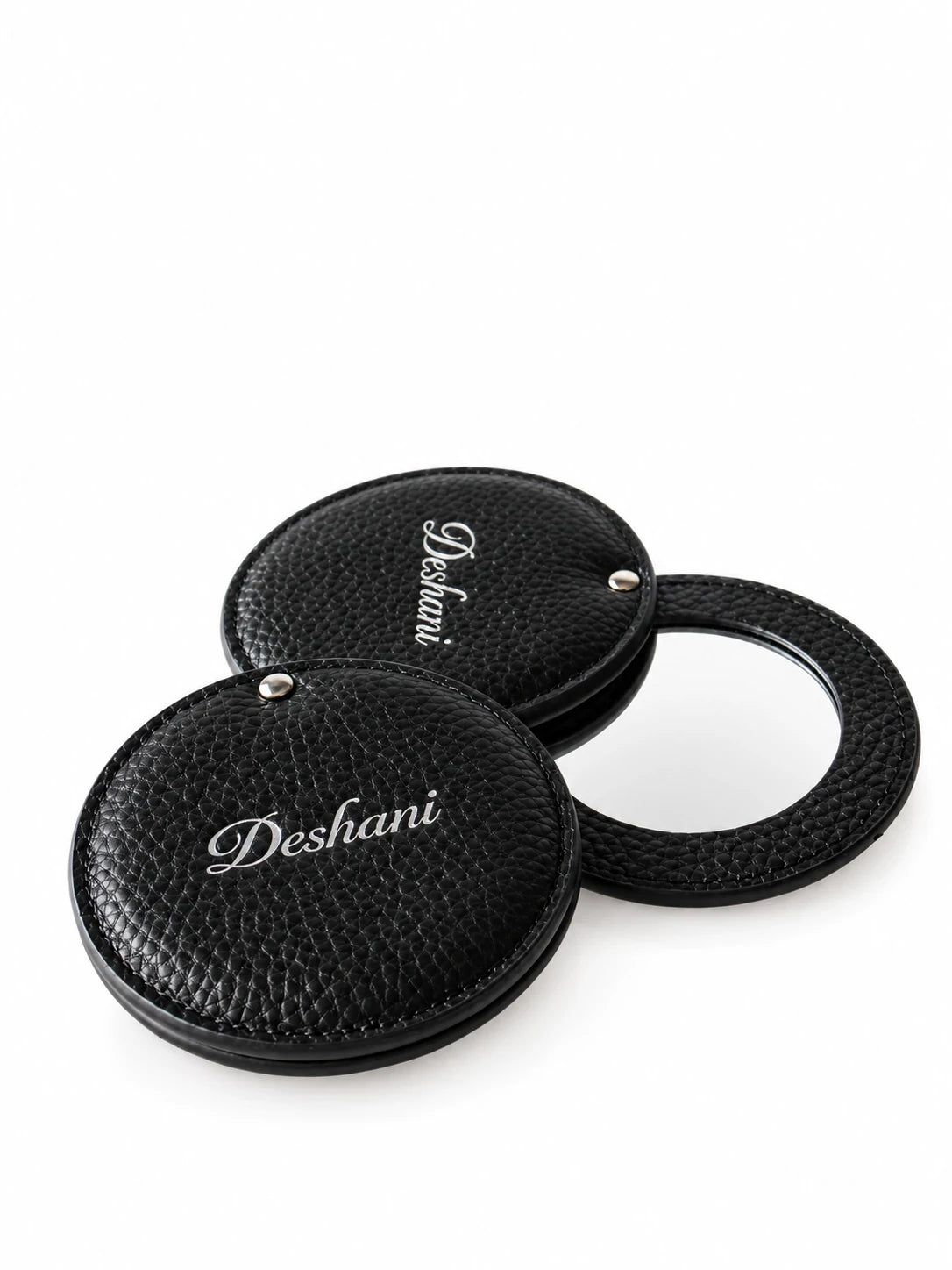 Deshani Compact Leather Mirror on a white background