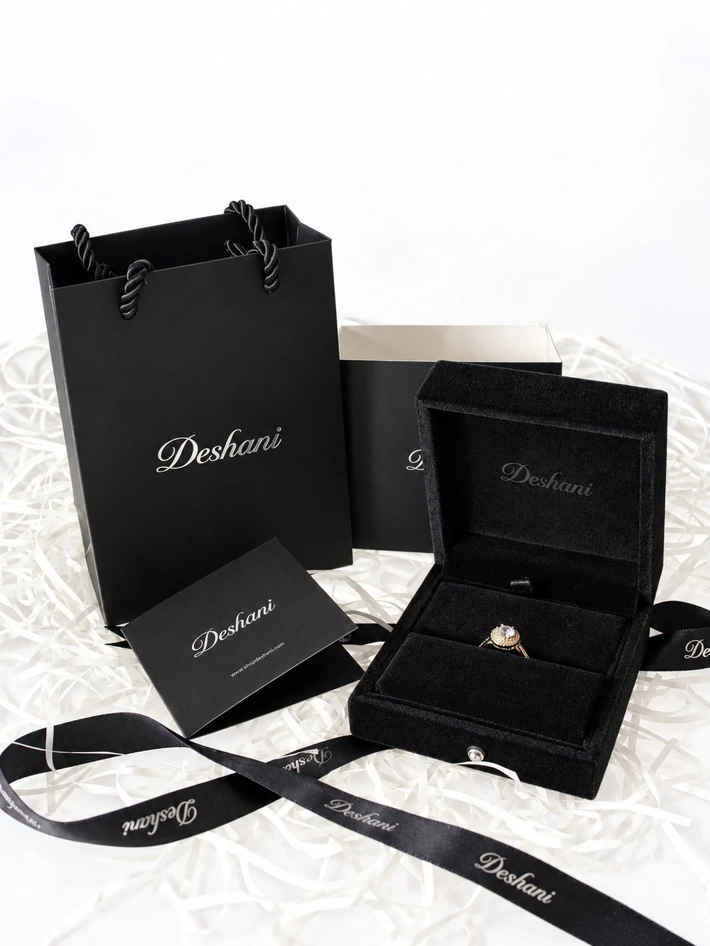 Gold Round Double Halo Ring in Deshani gift-ready packaging