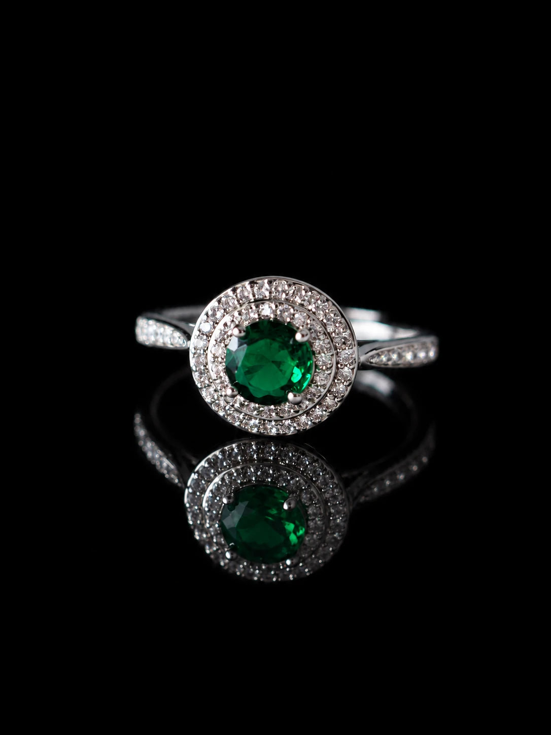 Silver Round CZ Halo Ring on a black background