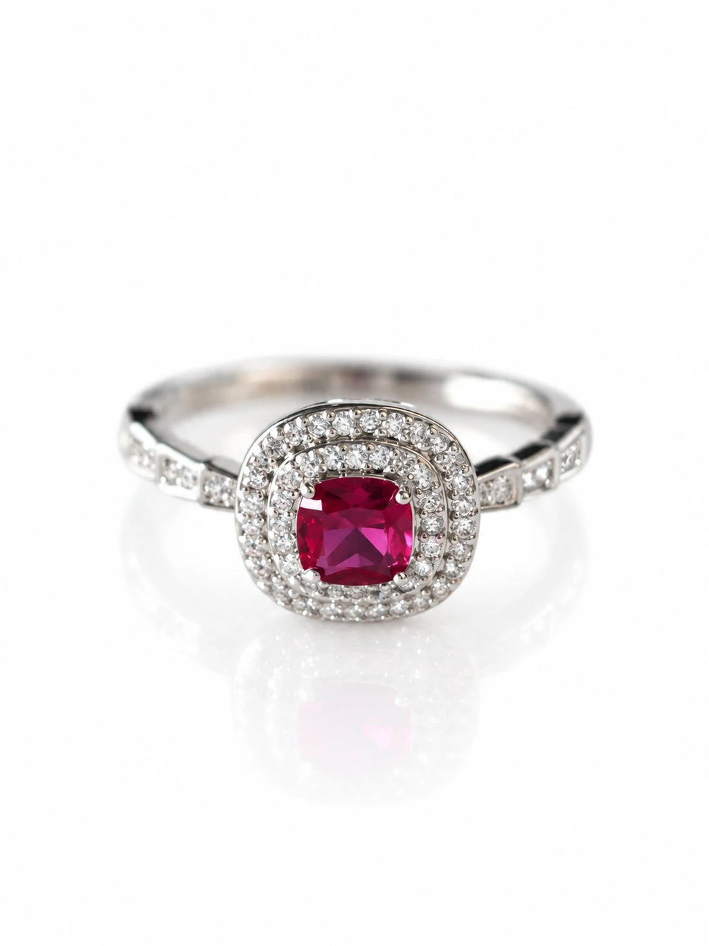 Silver Ruby-Red CZ Cushion Halo Ring on a white background