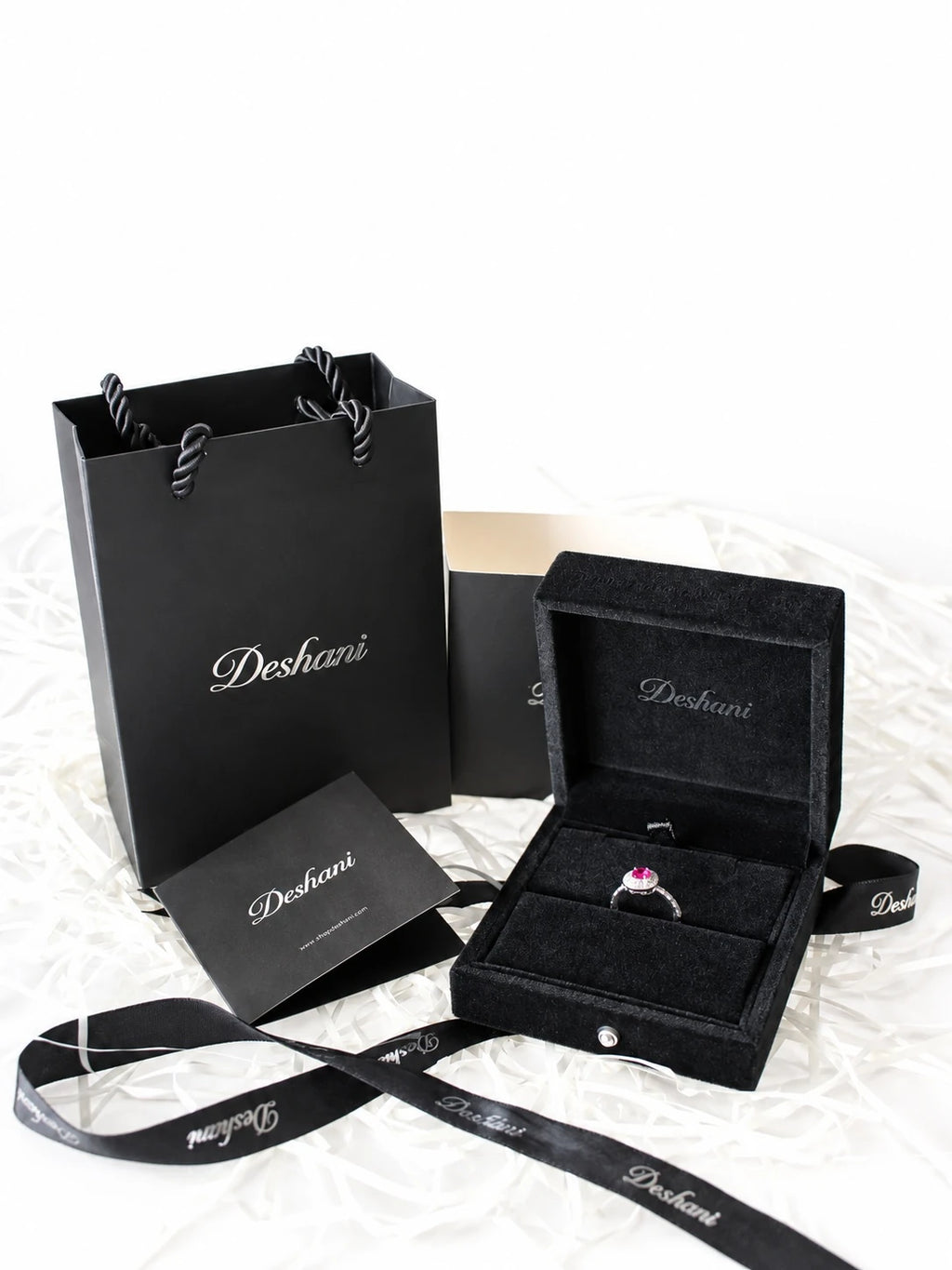 Silver Ruby-Red CZ Cushion Halo Ring in Deshani gift-ready packaging