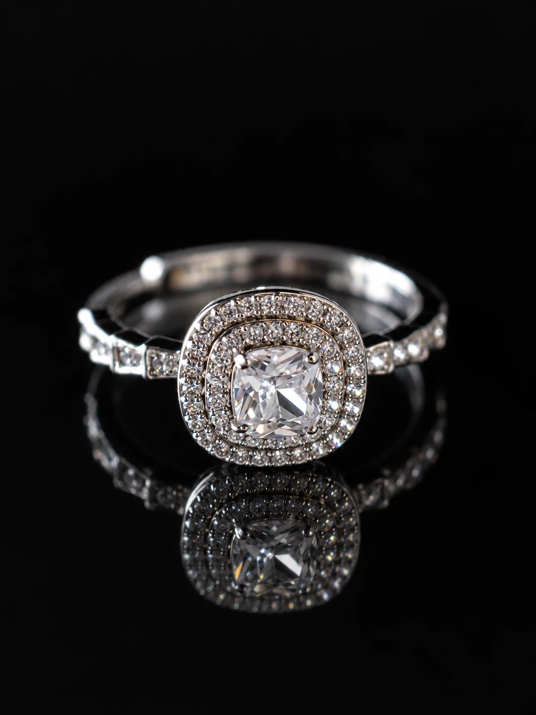 Silver Cushion Double Halo Ring on a black background