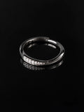 Silver Wave Pavé Band on a black background