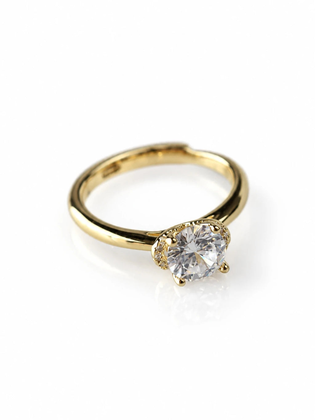Gold Round CZ Solitaire Ring on a white background