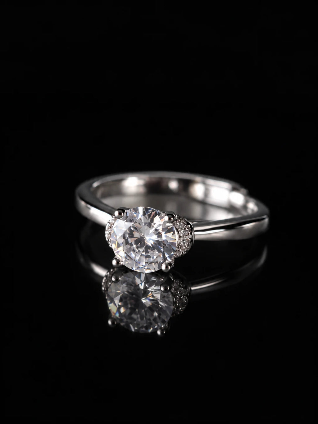 Silver Round CZ Solitaire Ring on a black background