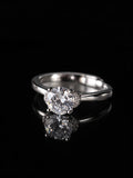 Silver Round CZ Solitaire Ring on a black background