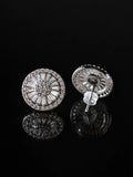 Sunburst CZ Stud Earrings on a black background