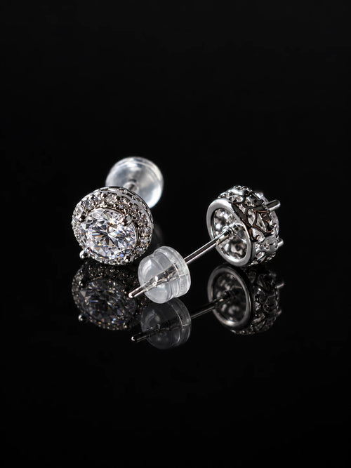 Silver CZ Starburst Stud Earrings on a black background