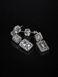Double Square Halo Drop Earrings on a black background