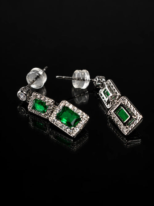 Double Emerald-Green CZ Drop Earrings on a black background