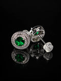 Vintage Emerald-Green CZ Halo Studs on a black background