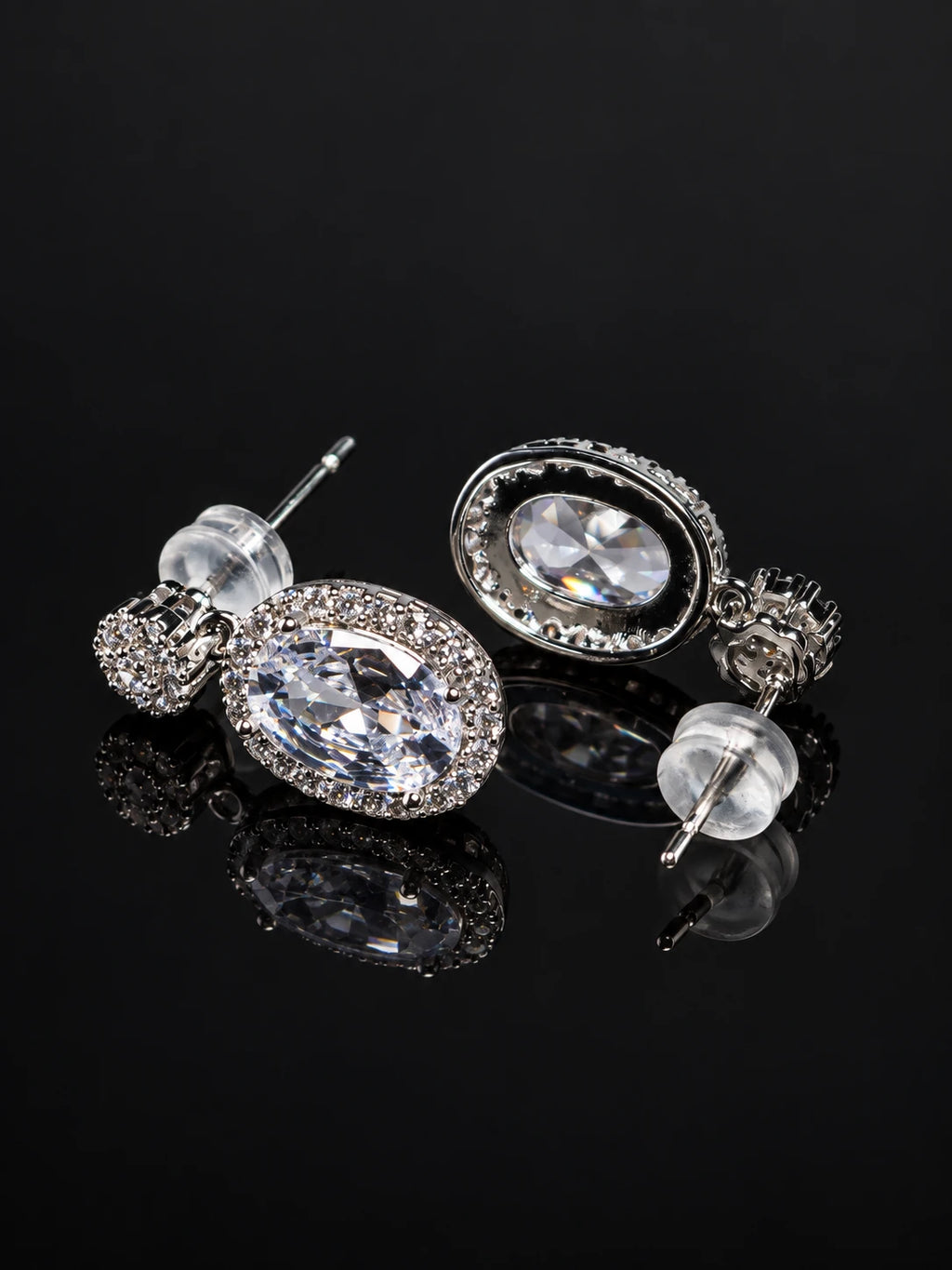 Vintage Silver Oval CZ Drop Earrings on a black background