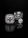 Silver Sunburst Square Earrings on a black background