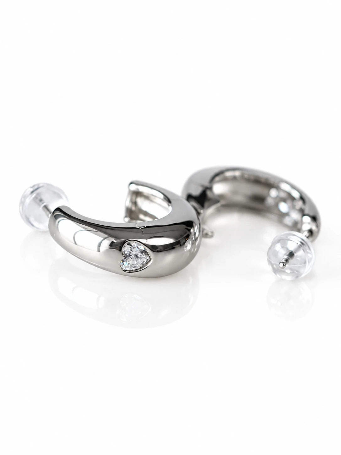 Silver Curve CZ Studs on a white background