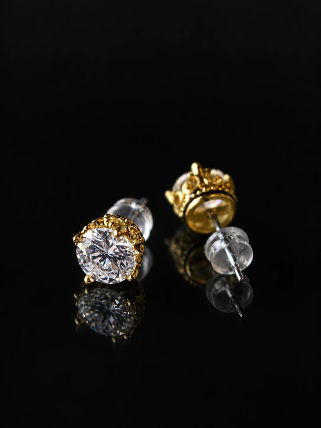 Gold Crown CZ Studs on a black background