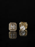 Gold Emerald-Cut Halo Studs on a black background