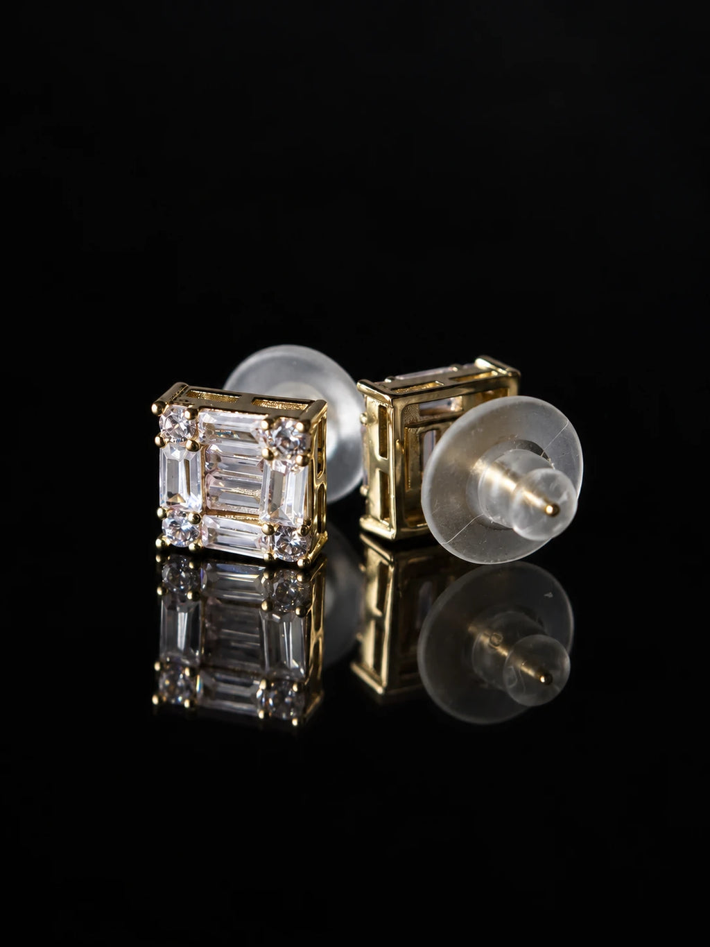 Gold Baguette Frame Studs on a black background