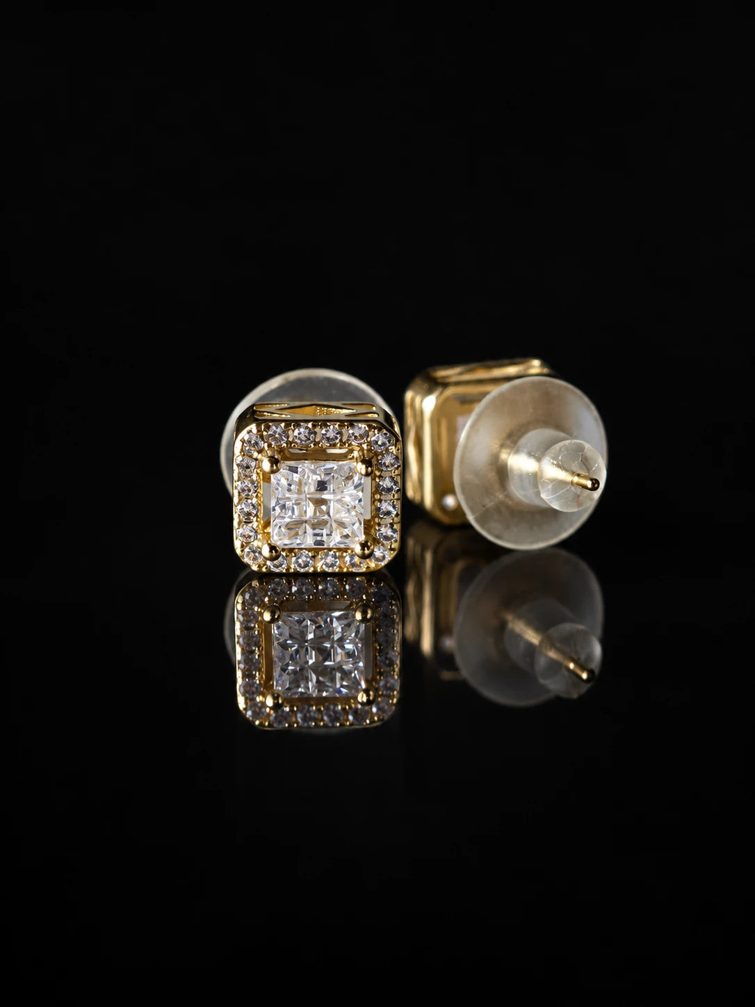 Gold Asscher-Cut Halo Studs on a black background