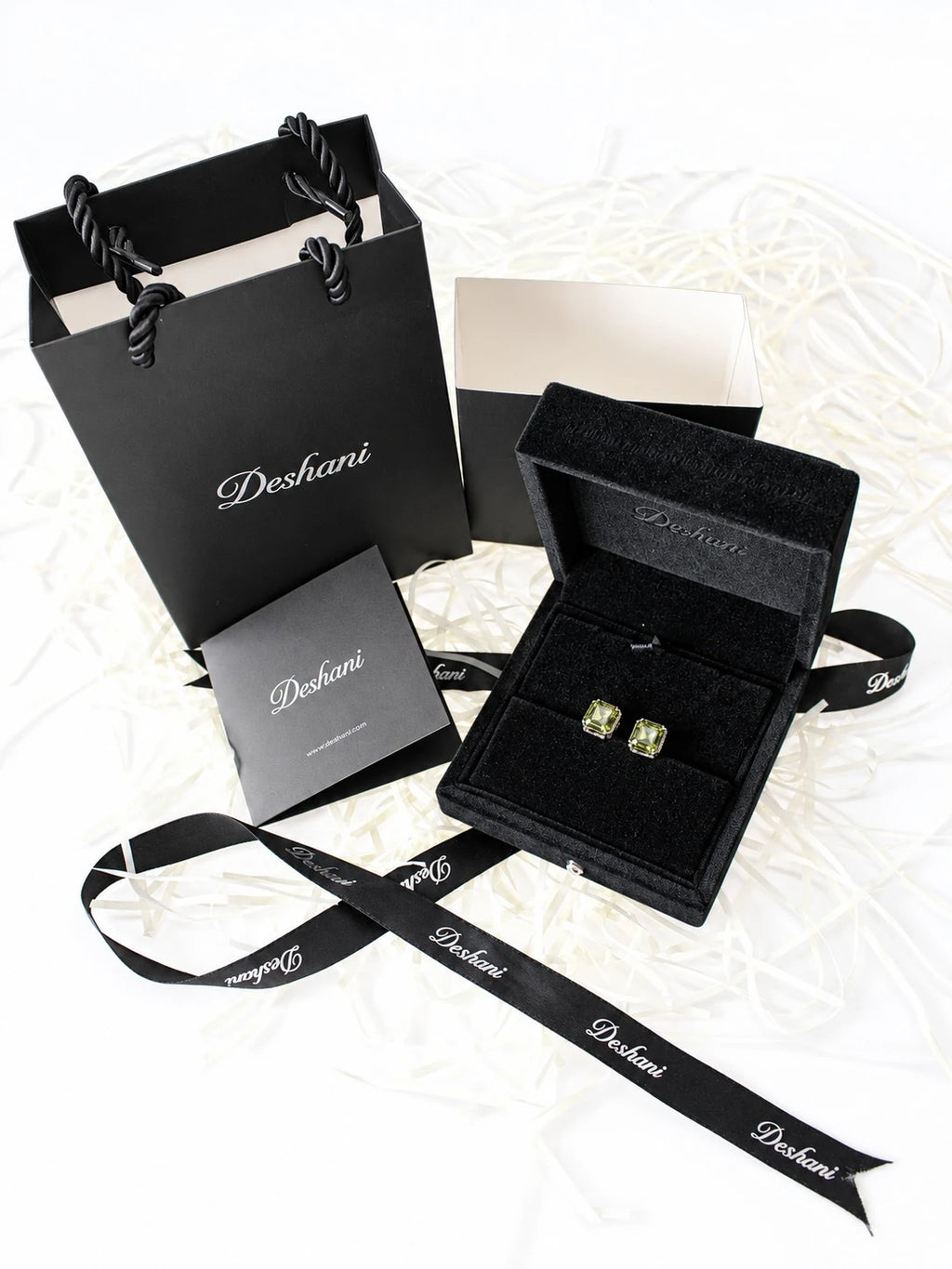 Gold Asscher-Cut Halo Studs in Deshani gift-ready packaging