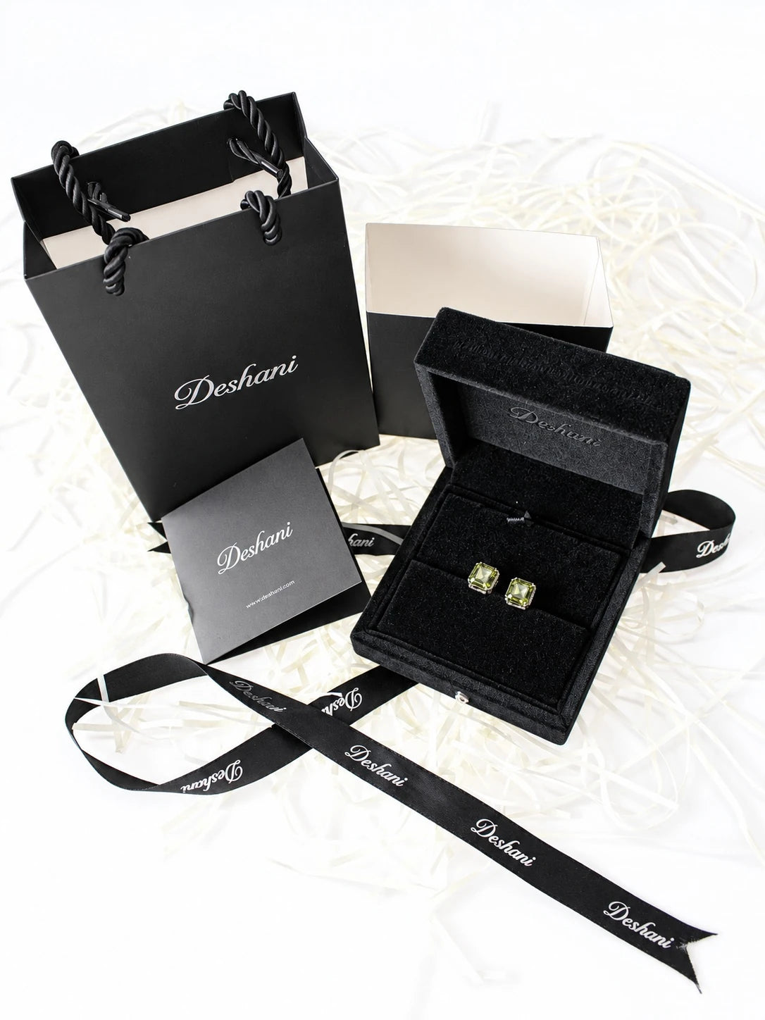 Gold Asscher-Cut Halo Studs in Deshani gift-ready packaging