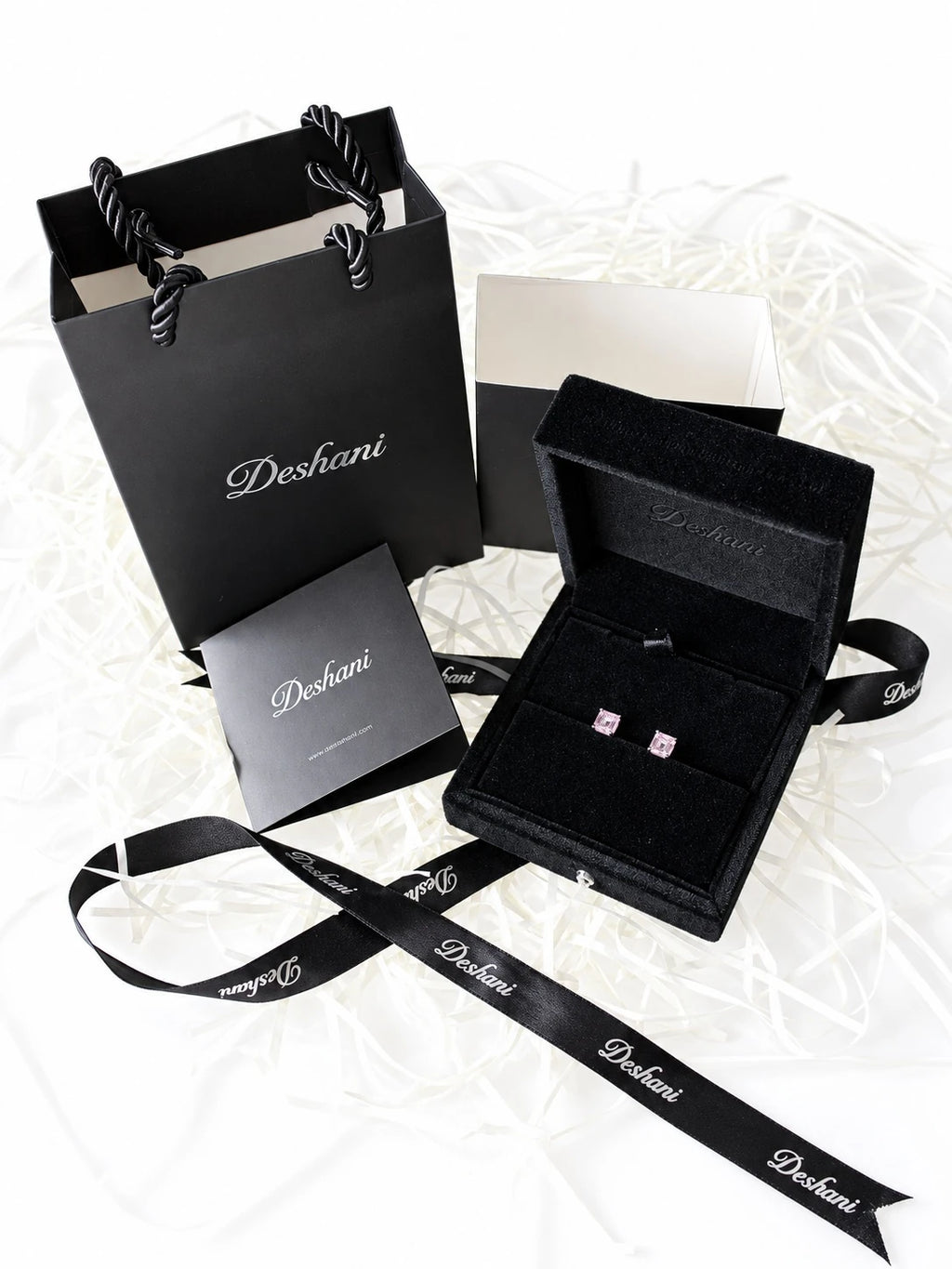 Gold Crown Solitaire Studs in Deshani gift-ready packaging