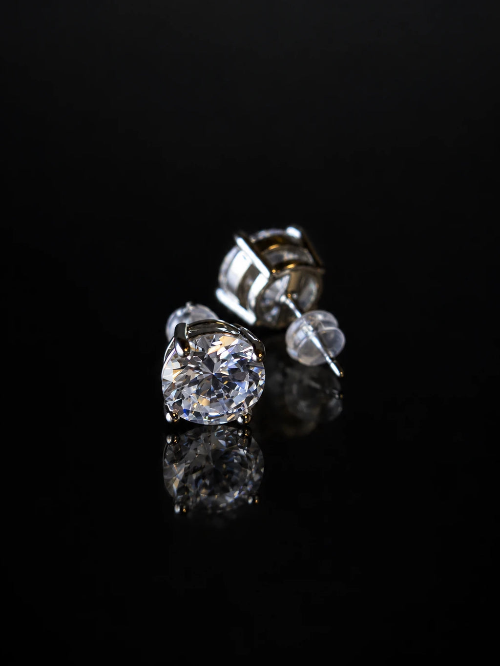Black CZ Basket Solitaire Studs on a black background