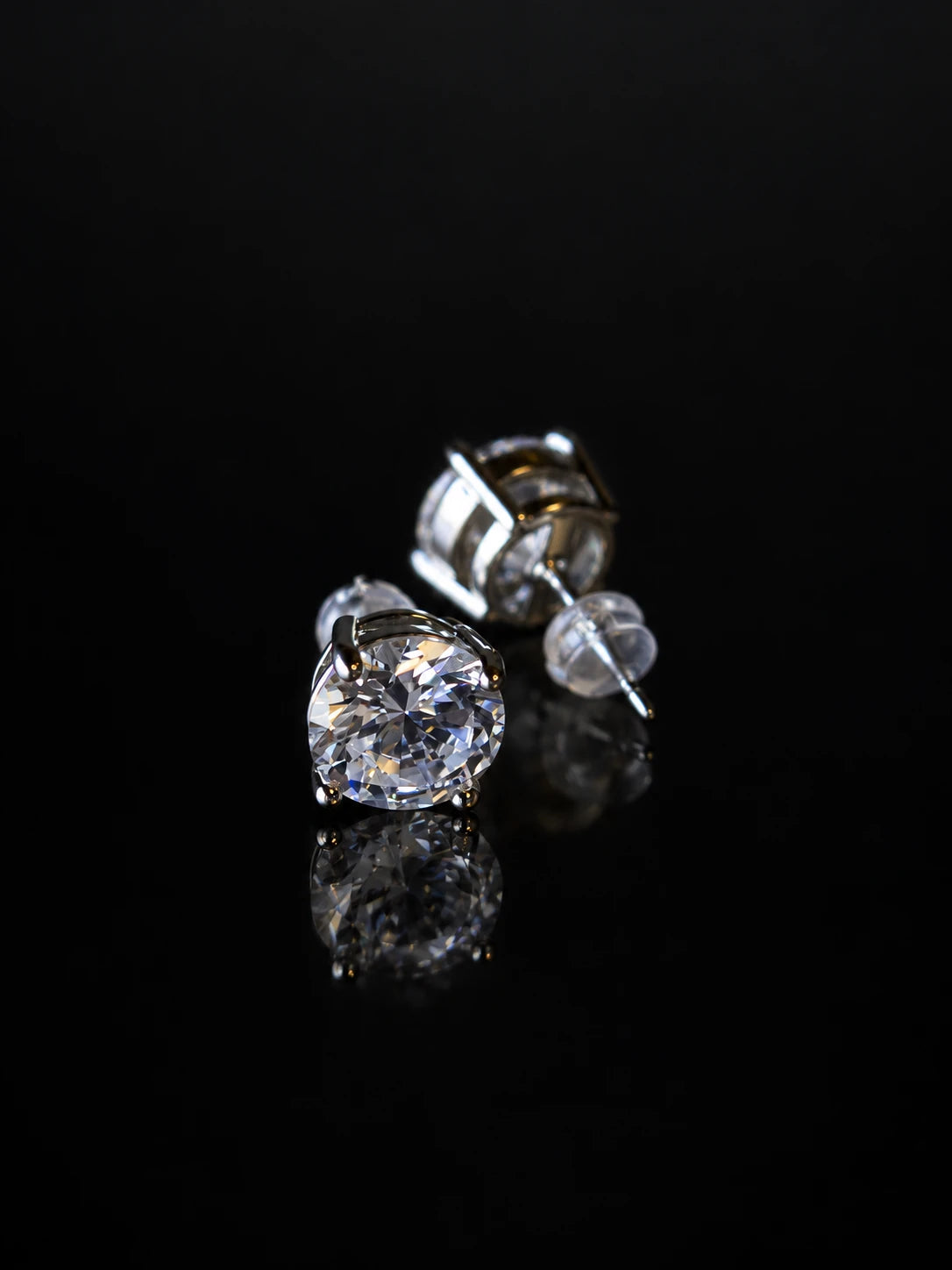 Black CZ Basket Solitaire Studs on a black background