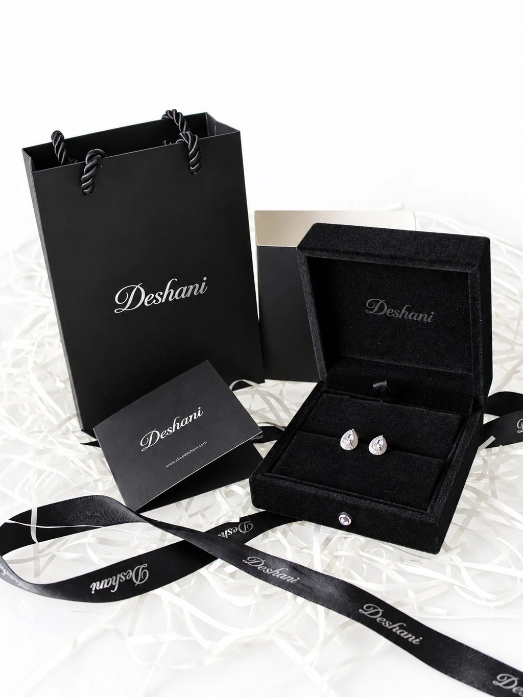 Gold Pear Halo Studs in Deshani gift-ready packaging