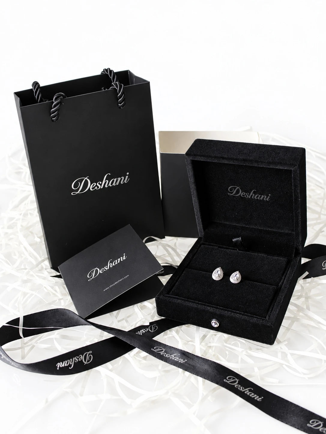 Gold Pear Halo Studs in Deshani gift-ready packaging