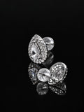 Silver Pear Halo Studs on a black background