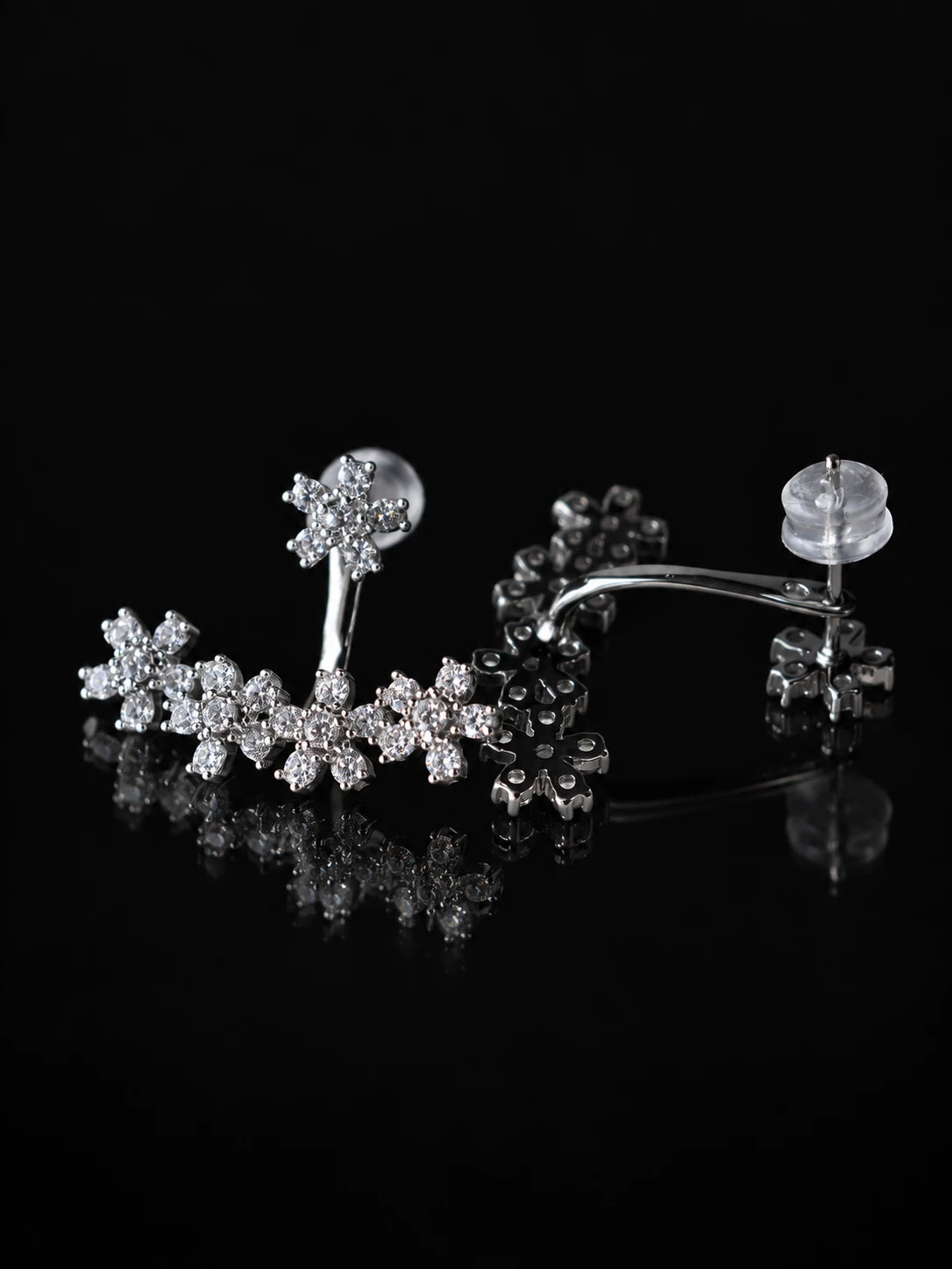 Silver Leaf Crawler Jacket Studs on a black background