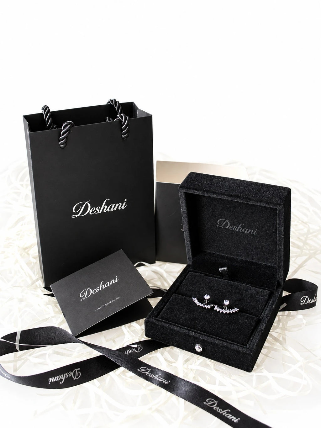 Black CZ Fan Jacket Studs in Deshani gift-ready packaging