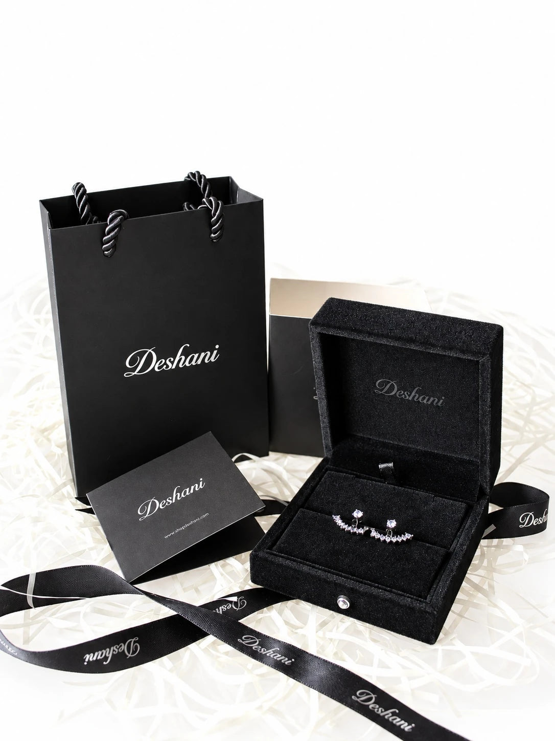 Black CZ Fan Jacket Studs in Deshani gift-ready packaging