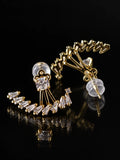 Gold CZ Fan Jacket Studs on a black background