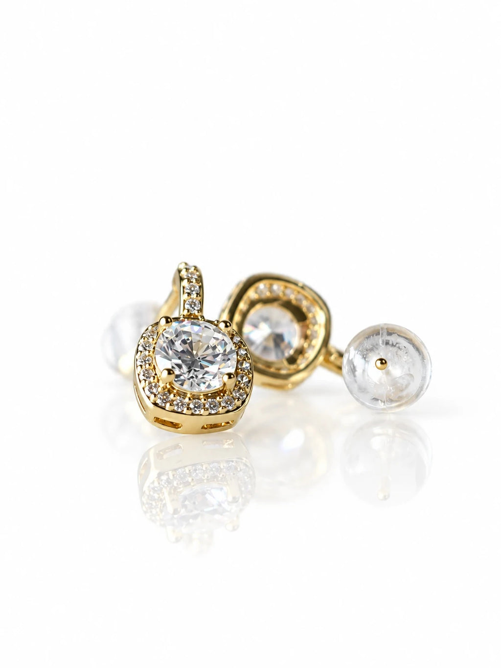 Gold Round Bezel Studs on a white background