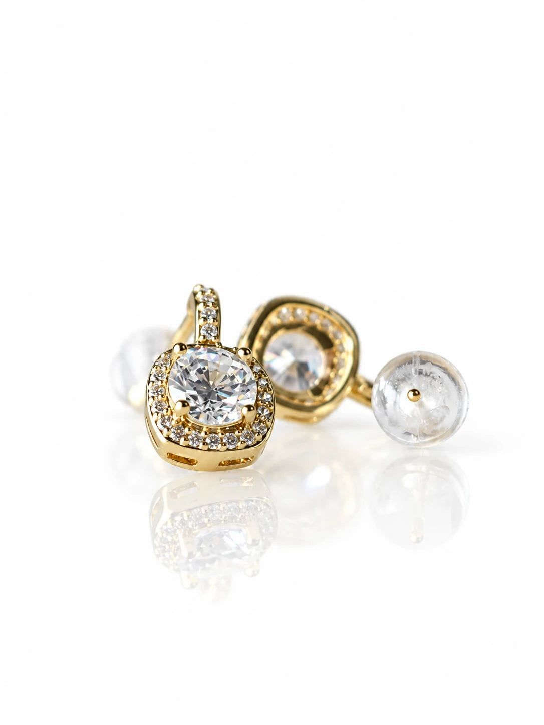 Gold Round Bezel Studs on a white background