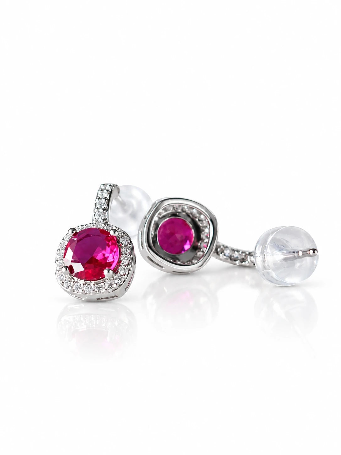 Silver Ruby-Red CZ Bezel Studs on a white background