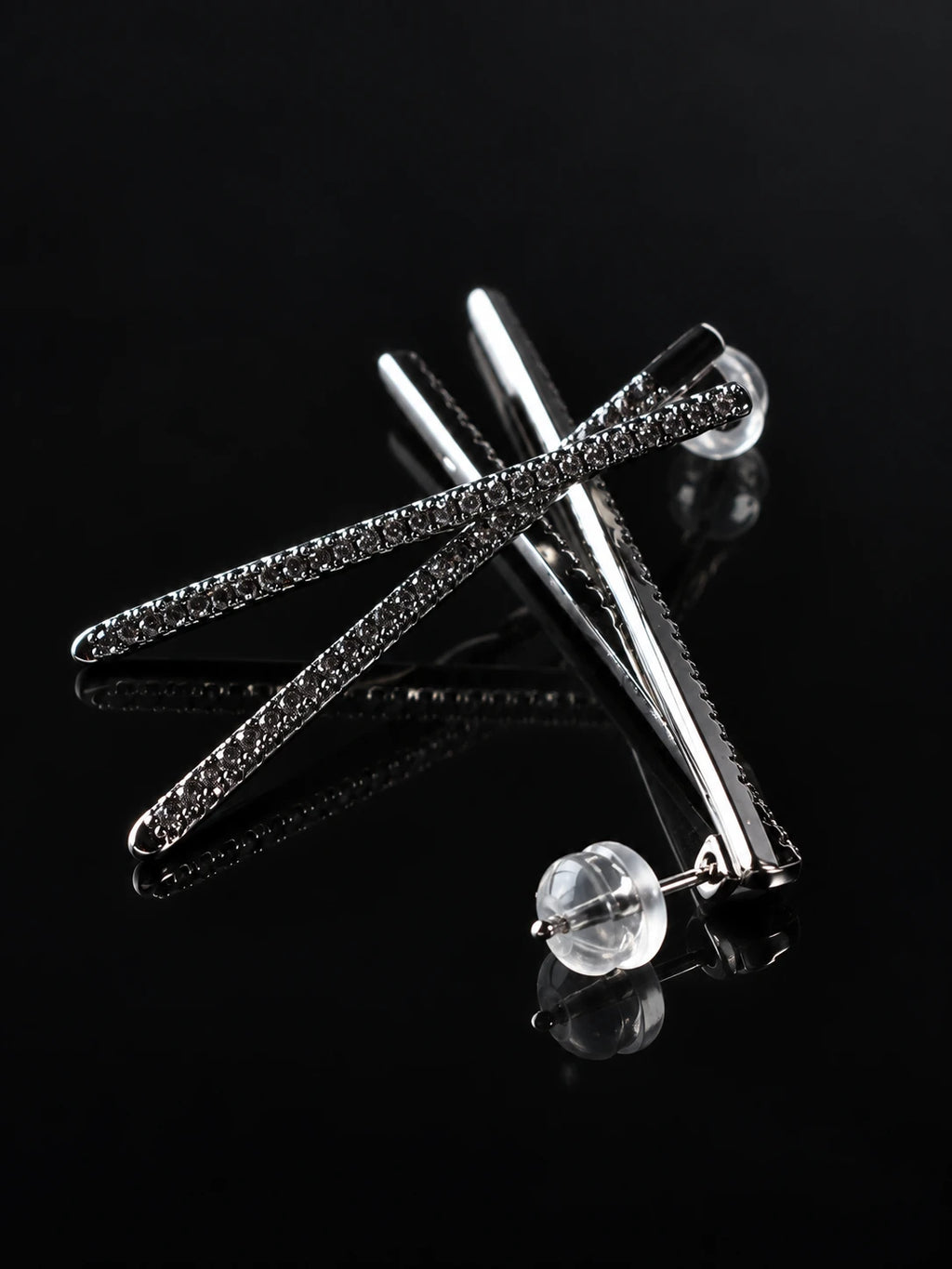 Silver Linear Pave Studs on a black background