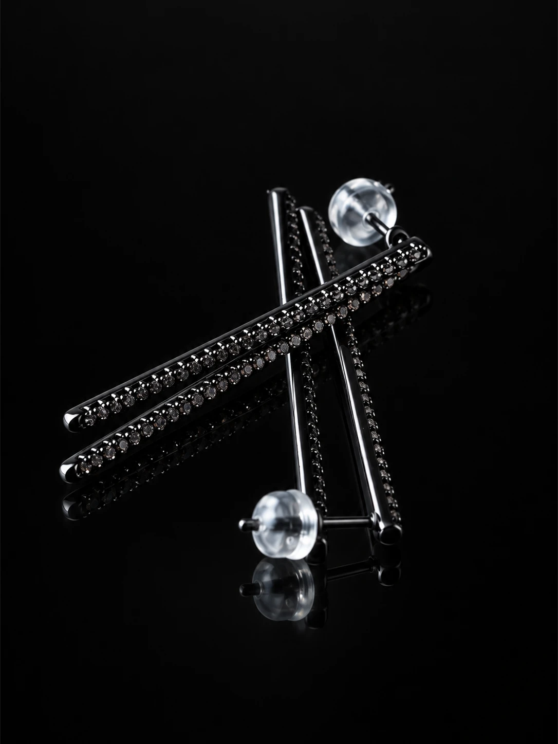 Black Silver Linear Pave Studs on a black background