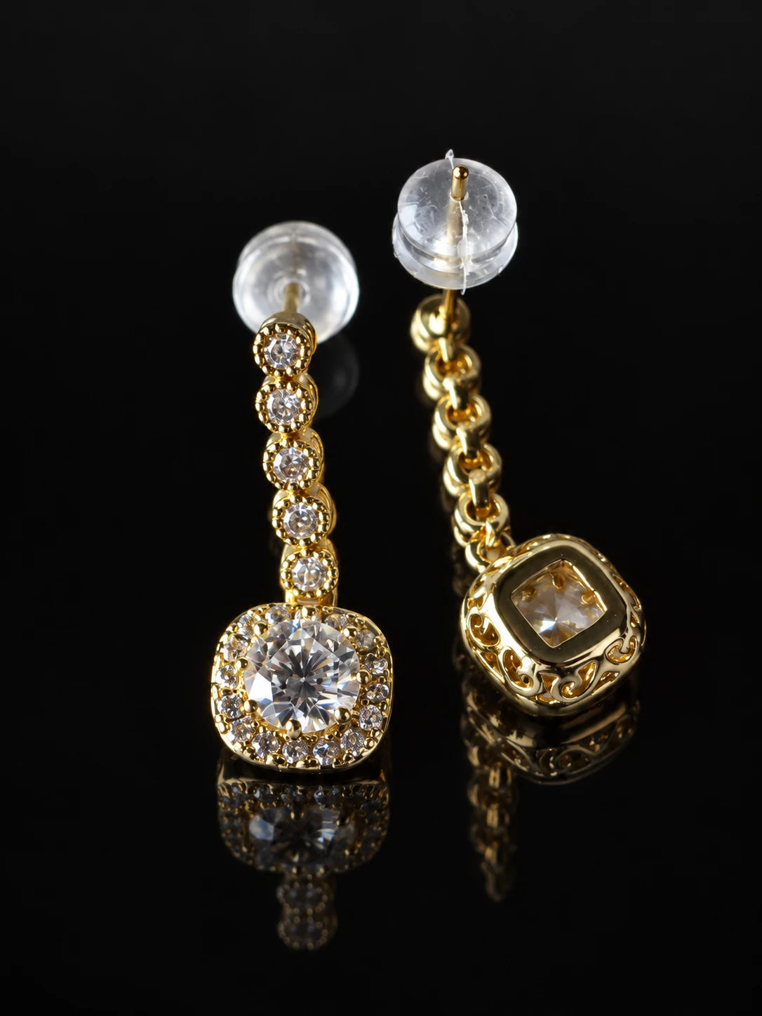 Gold Chain Halo Drops on a black background
