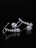 Silver Starline Ear Climbers on a black background