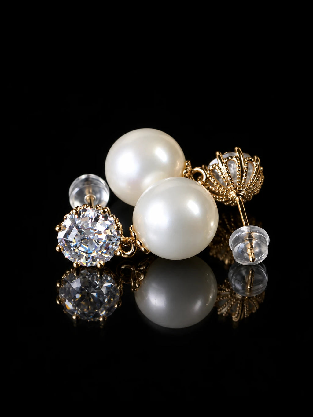 Gold Pearl Solitaire Studs on a black background