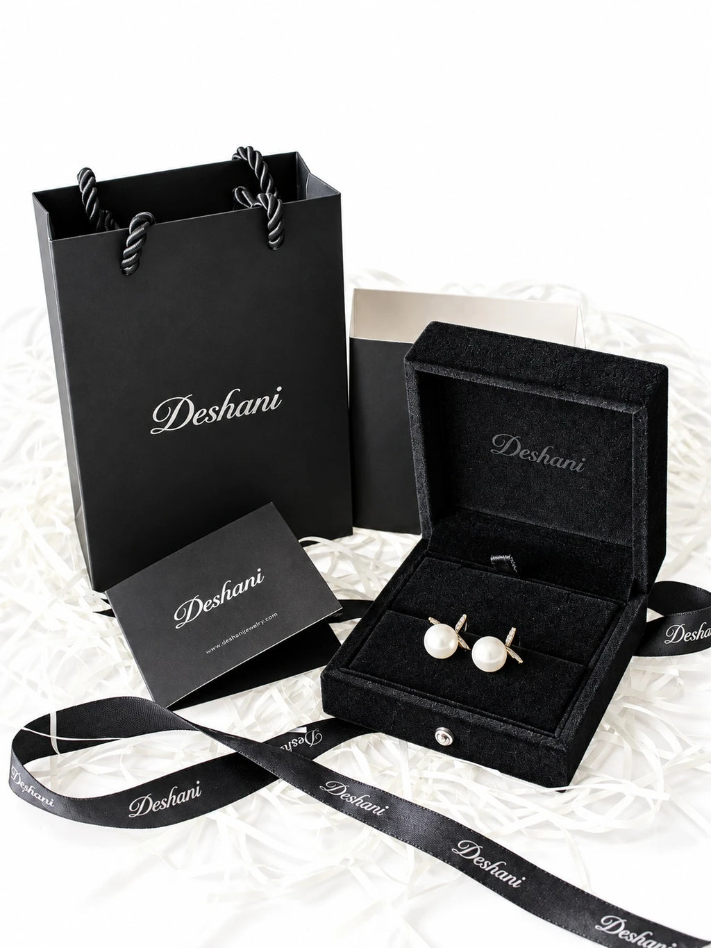 Gold Pearl Bow Studs in Deshani gift-ready packaging