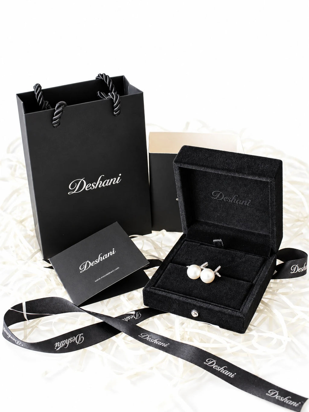 Silver Pearl Bow Studs in Deshani gift-ready packaging