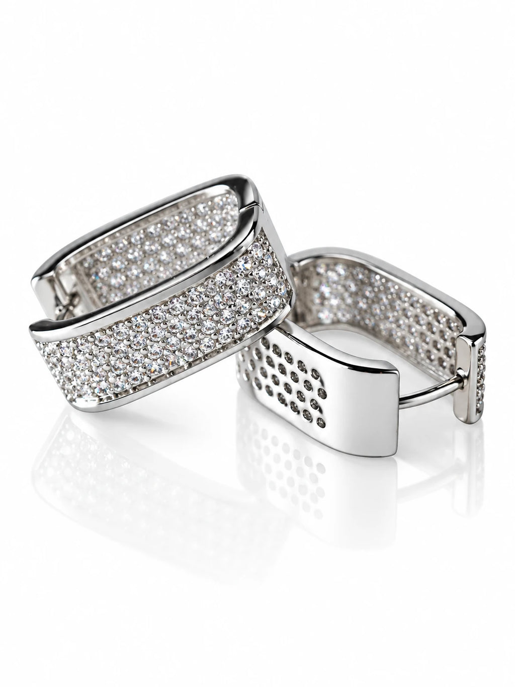 Silver Wide Pave Huggies on a white background