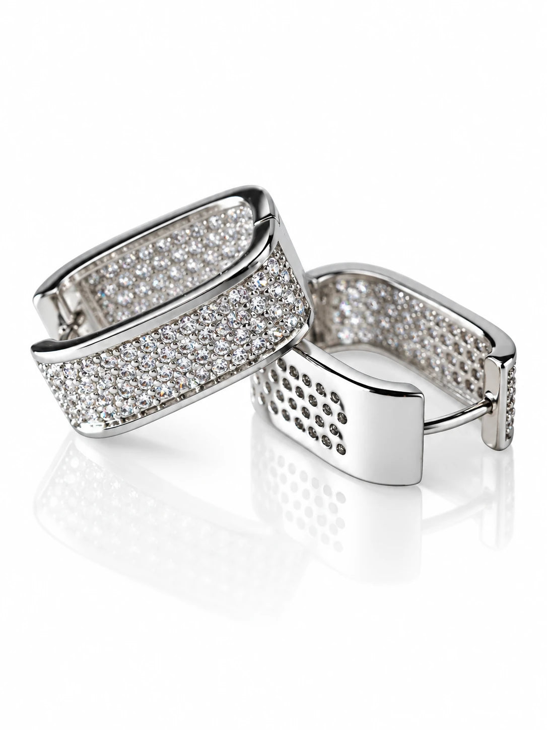 Silver Wide Pave Huggies on a white background
