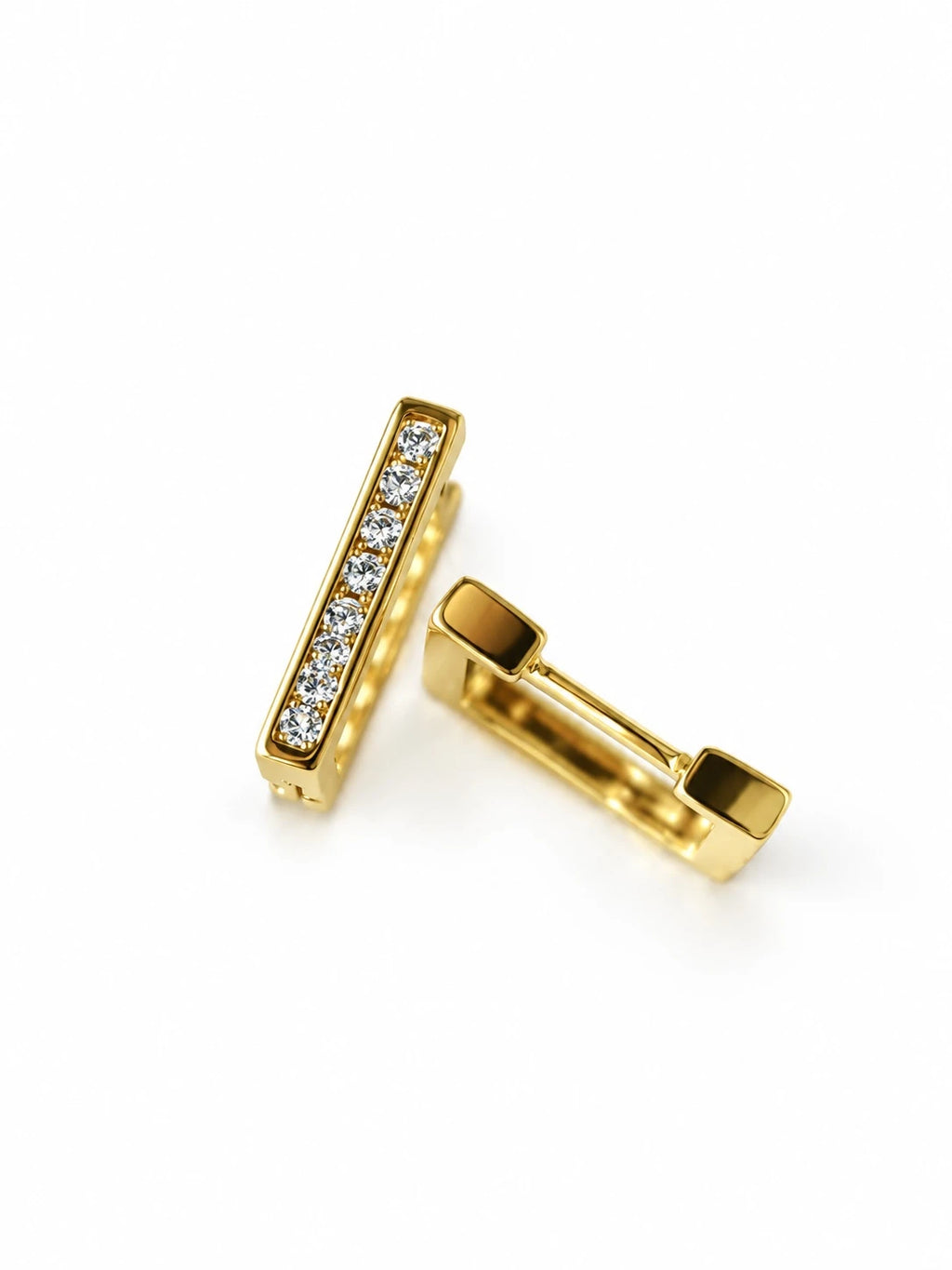 Gold Linear Pavé Huggies on a white background