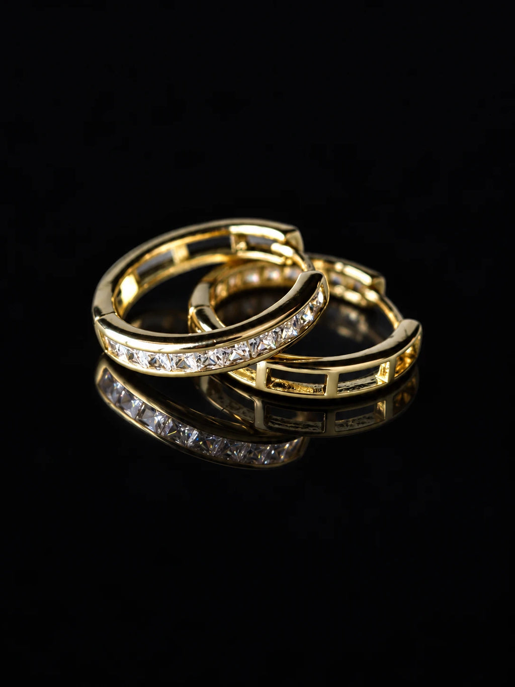 Gold Baguette Channel Hoops on a black background