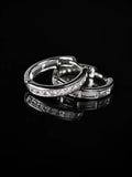 Silver Baguette Channel Hoops on a black background